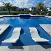 StoneHardscapes Bianca neve tumbled marble pool, coping and deck pavers 12x24
