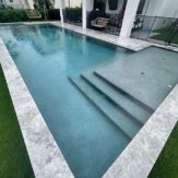 Stonehardscapes 12x24 marina grey xtreme grip marble pavers pool and coping