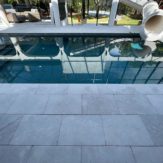 StoneHardscapes ice xtreme grip marble pavers coping and pool deck 16x24