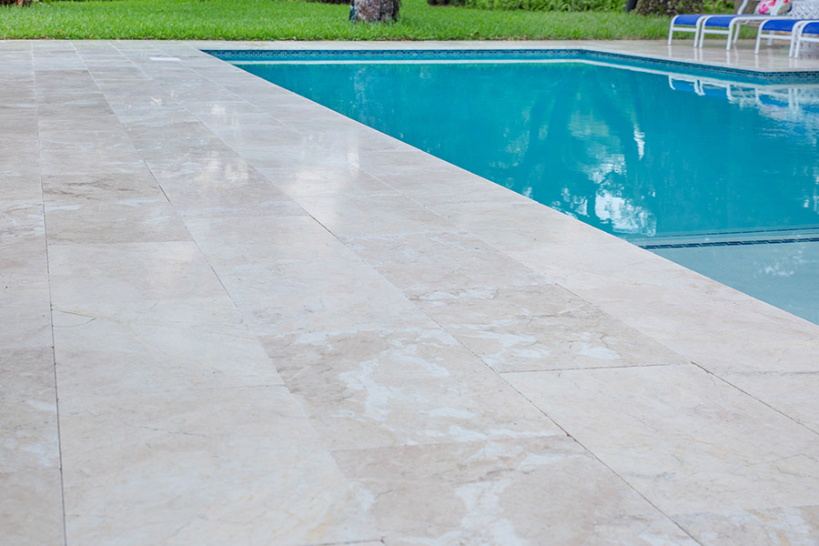 StoneHardscapes Corsica Marble Pavers Pool Deck and Coping