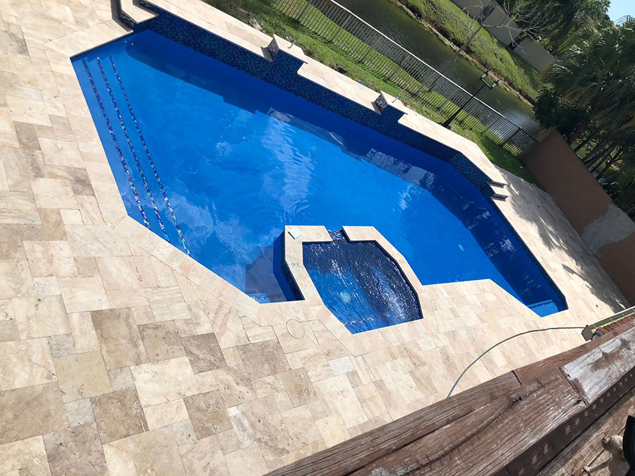 StoneHardscapes Tahitian Ivory French patter pavers pool deck