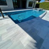 StoneHardscapes aspen white marble pavers pool deck and coping 16x24