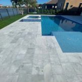 Stonehardscapes bianca neve xtreme grip marble pavers pool and spa 12x24