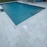 StoneHardscapes ice xtreme grip marble pavers pool deck and coping french patterns