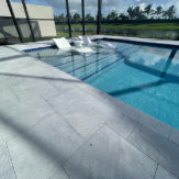StoneHardscapes Ice Xtreme Grip french pattern marble pavers pool deck