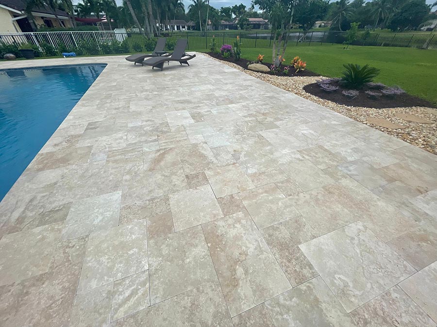 StoneHardscapes ivory plus travertine pavers pool and deck sealed french pattern
