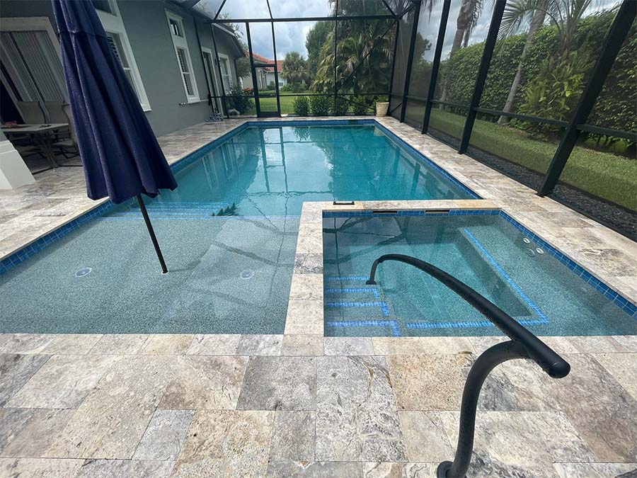 StoneHardscapes silver premium travertine pool deck and spa french pattern pavers 6x12