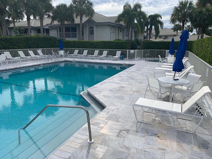 StoneHardscapes Turkish carrara leathered marble pavers pool deck and copying french pattern