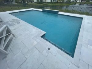 StoneHardscapes ice xtreme grip marble pavers pool deck and coping french patterns