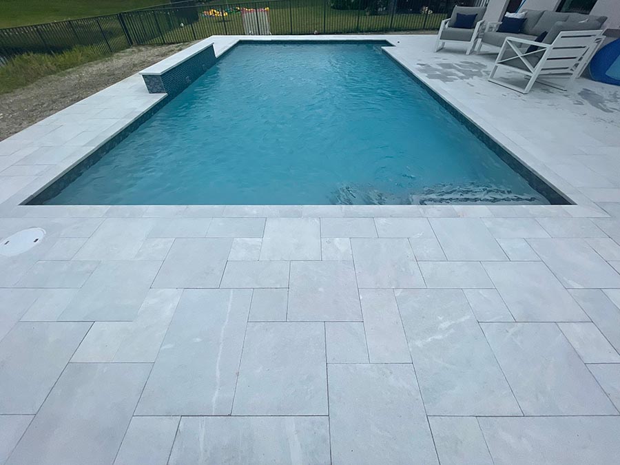 StoneHardscapes ice xtreme grip marble pavers pool and deck french patterns