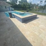 StoneHardscapes Ivory premium travertine pavers pool deck