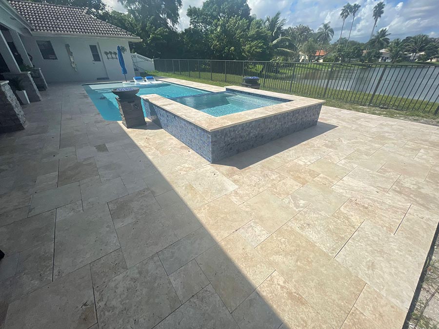 StoneHardscapes Ivory premium travertine pavers pool deck