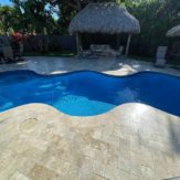 StoneHardscapes ivory premium travertine pavers pool deck and coping