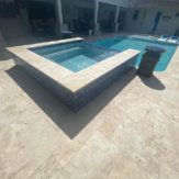 StoneHardscapes Ivory premium travertine pavers pool deck and spa