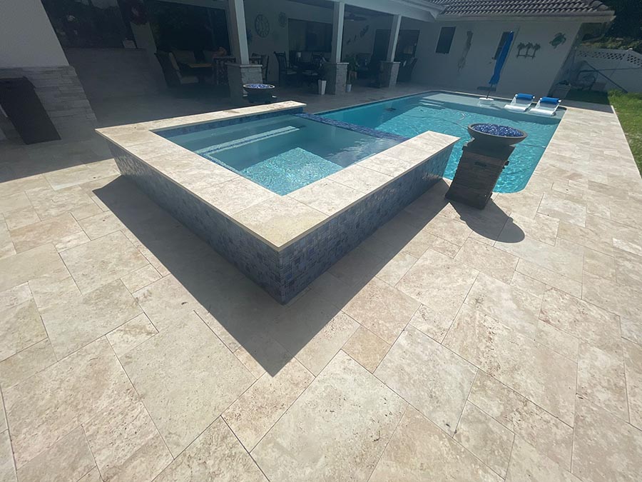 StoneHardscapes Ivory premium travertine pavers pool deck and spa