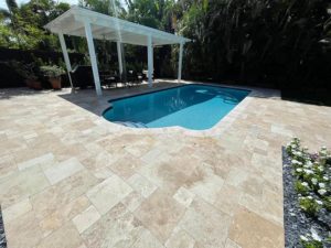 StoneHardscapes mocha premium travertine pavers pool deck french pattern