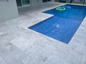 StoneHardscapes marina grey xtreme grip marble pavers french pattern 12X24 pool deck