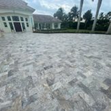 StoneHardscapes silver plus travertine pavers driveway french patterns
