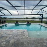 StoneHardscapes silver premium travertine pavers pool and deck french pattern