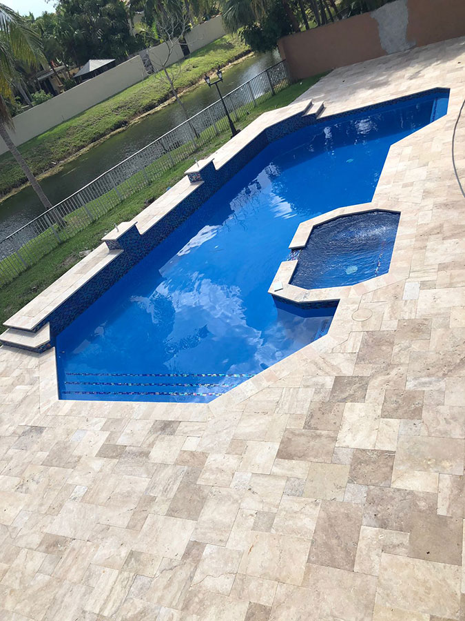 StoneHardscapes Tahitian Ivory French patter pavers pool deck